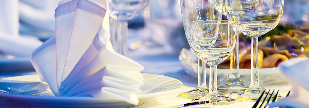 Glassware and place settings on table at our central new jersey exclusive catering venues. 